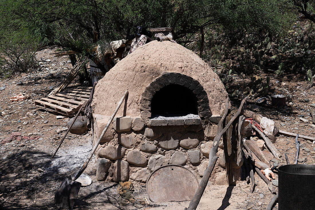 A traditional mud oven behind a house near Seclantas, Argentina in the Calchaqui Valley.