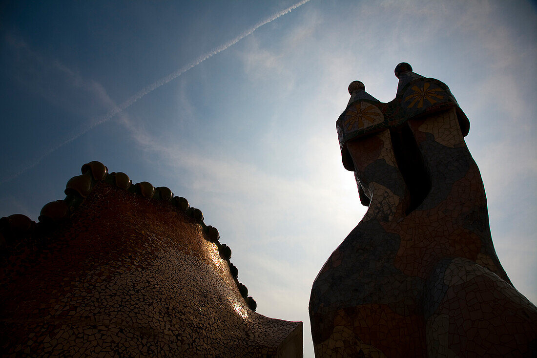 Barcelona, Spain, Sept 4 2008, Chimneys rise against the sky at Casa Batlló, showcasing Gaudís unique architectural style in the heart of Barcelona.