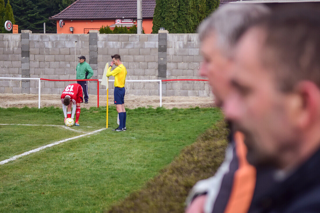 Corner kick during soccer youth game in small town of Hungary