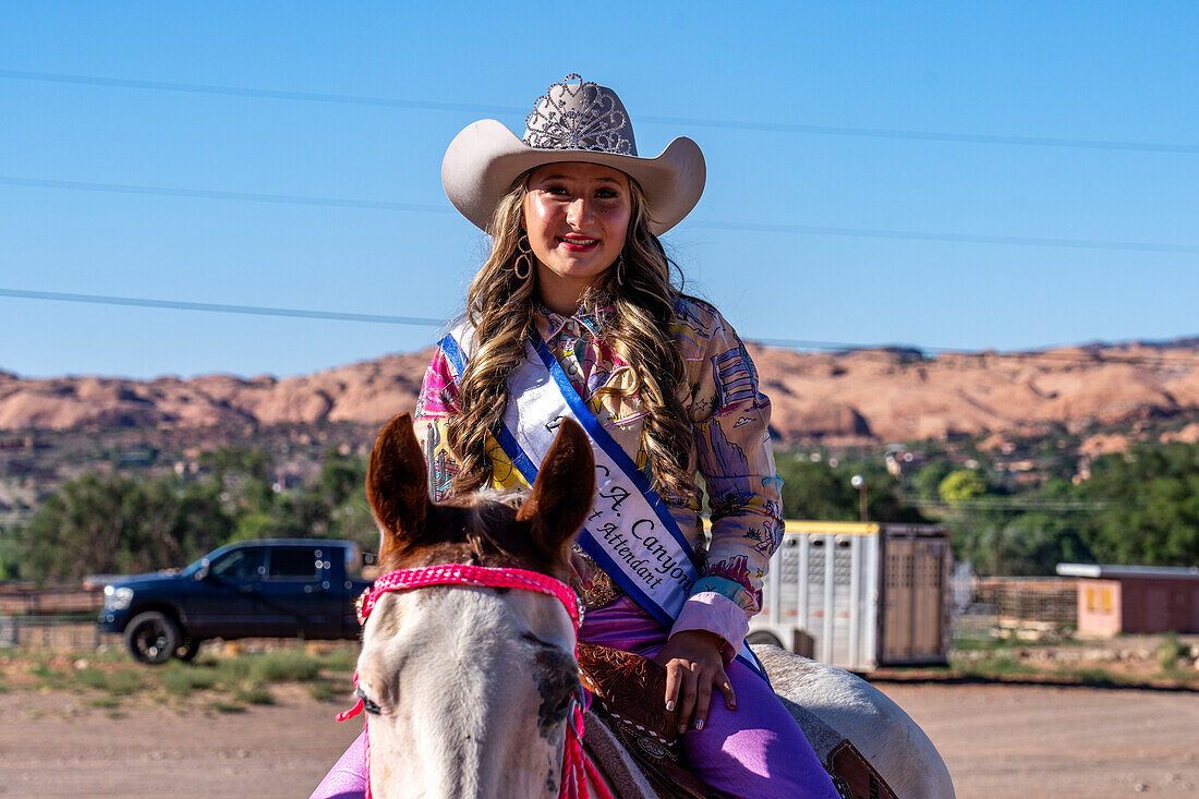 The rodeo queen's 1st Attendant poses on horseback before the Moab Junior Rodeo in Utah.