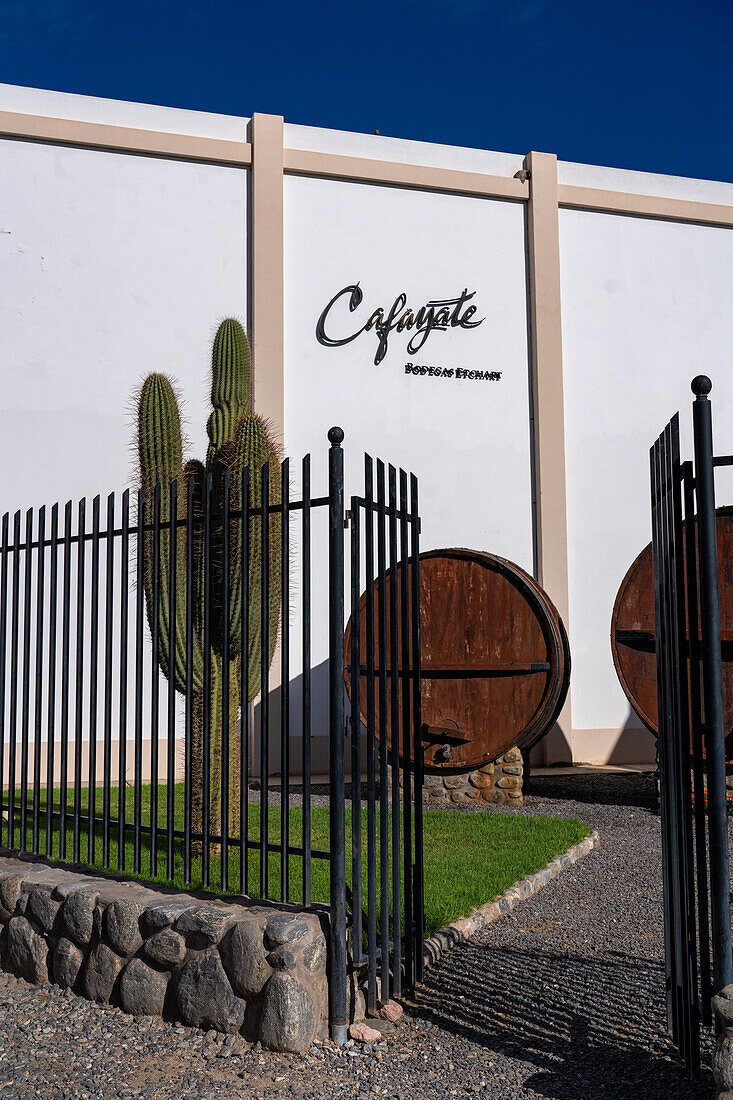 The Bodga Etchart winery in Cafayate, Argentina with large vintage wine casks.