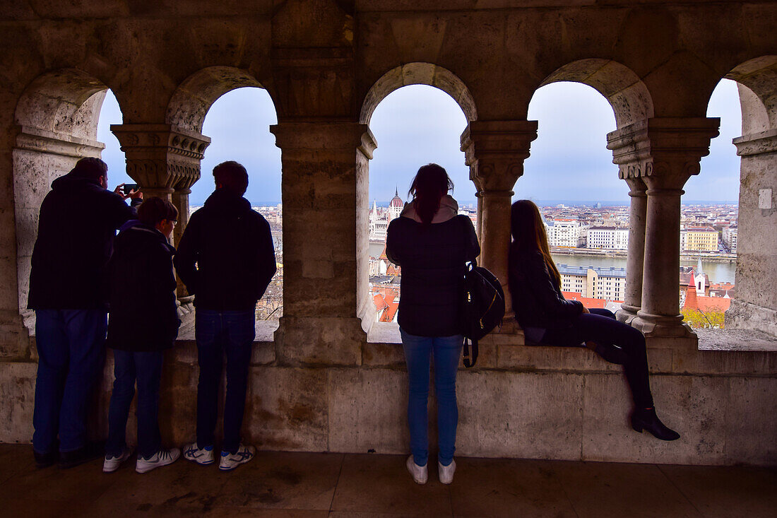 View of Parliament building, Chain Bridge and Danube River through old columns, Budapest, Hungary, Europe