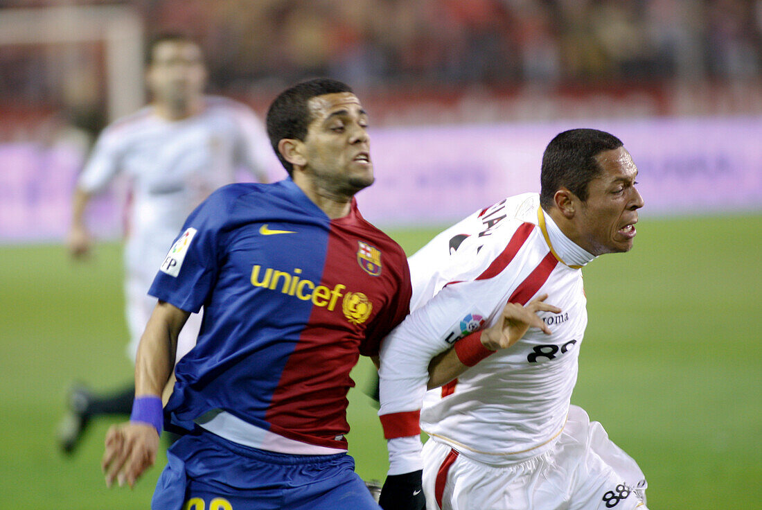 Seville, Spain, Nov 30 2008, Dani Alves takes on Adriano at Sánchez Pizjuán, where Barcelona beat Sevilla 3-0 on Nov 29, 2008.