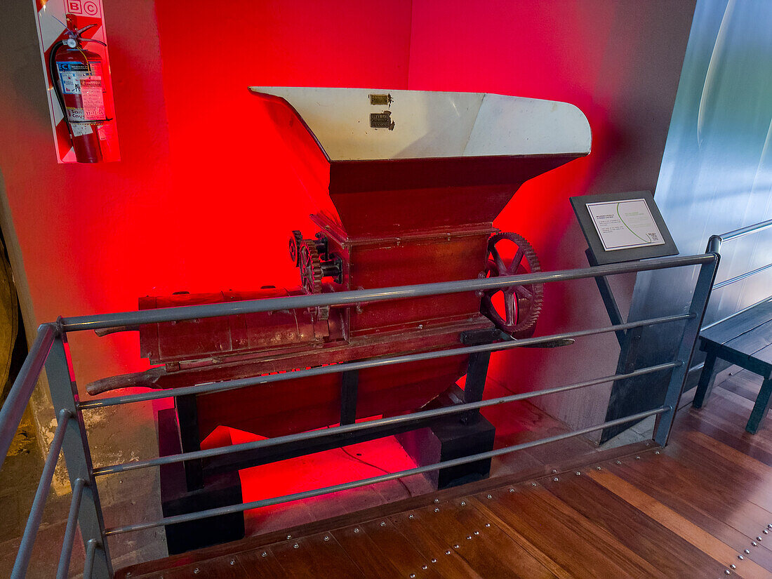 A vintage roller grinder or continuous press in the Museo de la Vid y el Vino or Museum of the Vine and the Wine in Cafayate, Argentina.