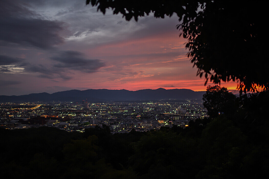 Night views of Kyoto from viewpoint at Fushimi Inari Taisha temple, Kyoto, Japan