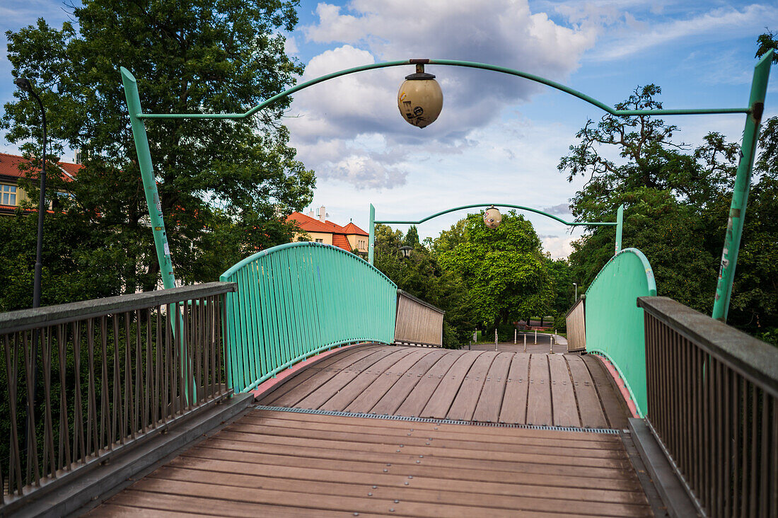 Wooden bridge in city park, Prague