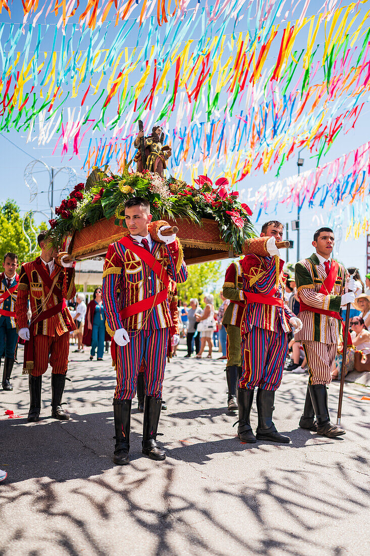 Religious procession finishing at São João Baptista Church during the Festival of Saint John of Sobrado, also known as Bugiada and Mouriscada de Sobrado, takes place in the form of a fight between Moors and Christians , locally known as Mourisqueiros and Bugios, Sao Joao de Sobrado, Portugal