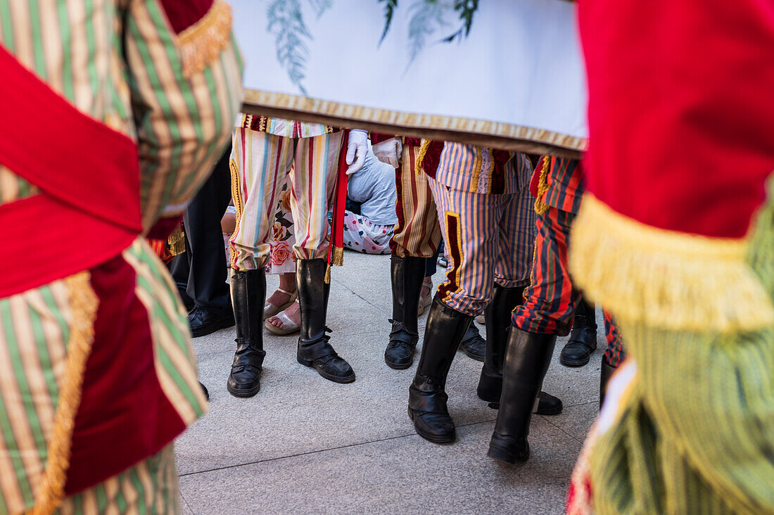 Religious procession enters São João Baptista Church during the Festival of Saint John of Sobrado, also known as Bugiada and Mouriscada de Sobrado, takes place in the form of a fight between Moors and Christians , locally known as Mourisqueiros and Bugios, Sao Joao de Sobrado, Portugal