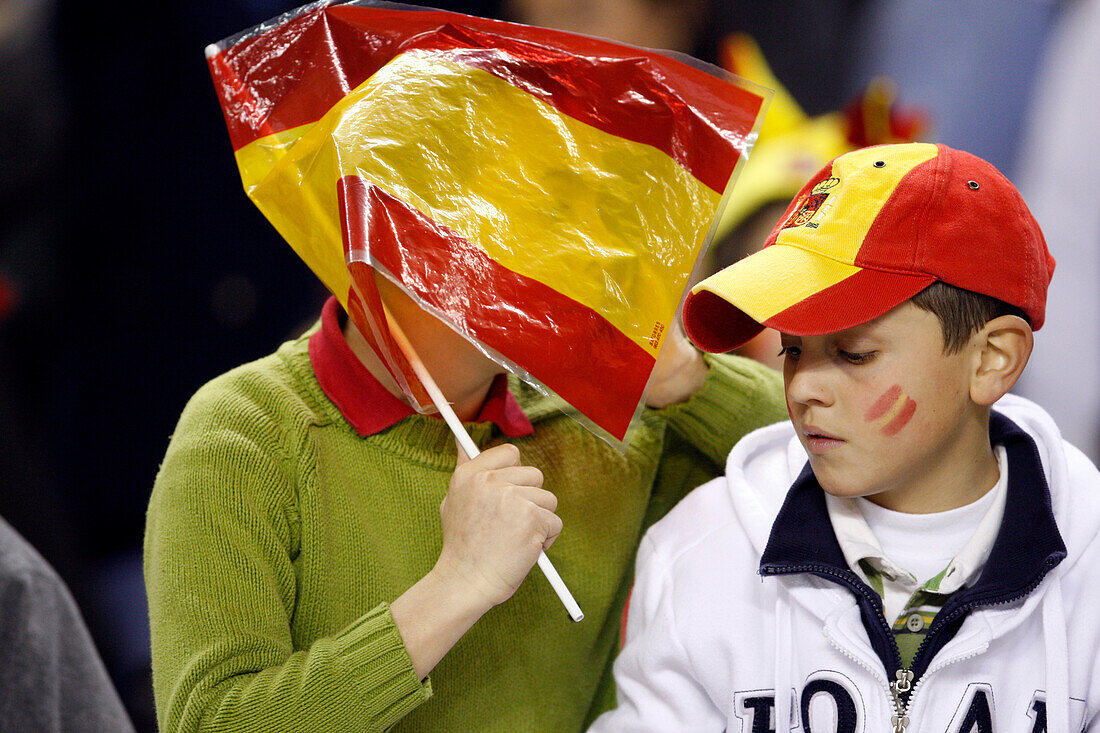 Seville, Spain, Feb 11 2009, Two young Spanish fans cheer during the friendly match between Spain and England at Sánchez Pizjuán Stadium in Sevilla.