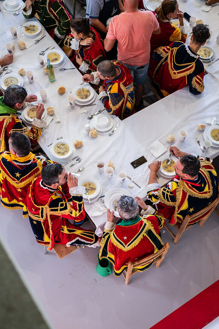 Traditional lunch at The Festival of Saint John of Sobrado, also known as Bugiada and Mouriscada de Sobrado, takes place in the form of a fight between Moors and Christians , locally known as Mourisqueiros and Bugios, Sao Joao de Sobrado, Portugal