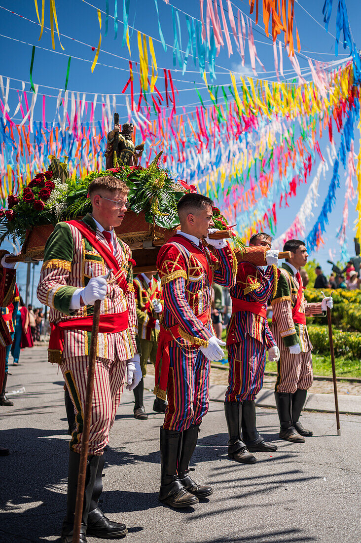 Religious procession finishing at São João Baptista Church during the Festival of Saint John of Sobrado, also known as Bugiada and Mouriscada de Sobrado, takes place in the form of a fight between Moors and Christians , locally known as Mourisqueiros and Bugios, Sao Joao de Sobrado, Portugal