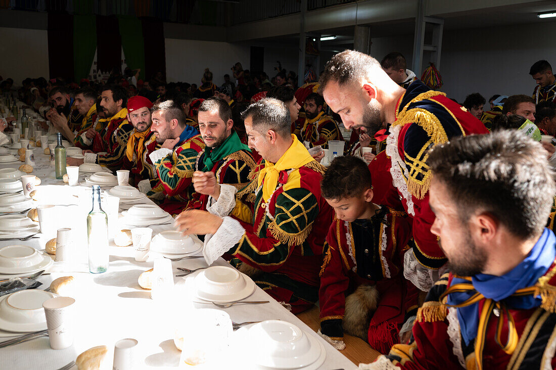 Traditional lunch at The Festival of Saint John of Sobrado, also known as Bugiada and Mouriscada de Sobrado, takes place in the form of a fight between Moors and Christians , locally known as Mourisqueiros and Bugios, Sao Joao de Sobrado, Portugal