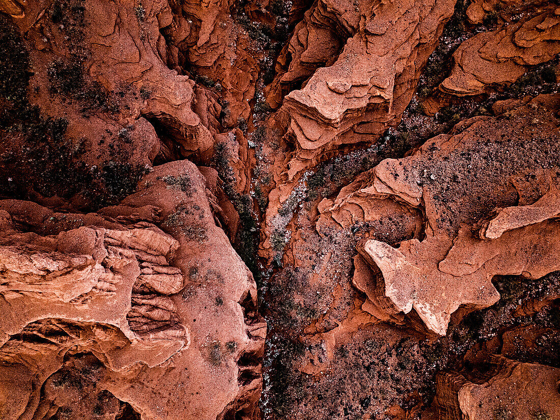 Striking red sandstone cliffs in Kok-Moinok Canyon, Kyrgyzstan, Central Asia, Asia