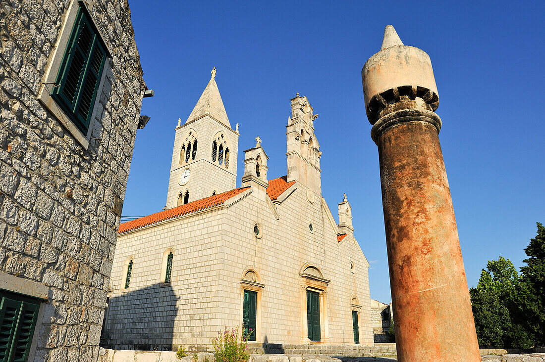 Typical chimney in front of the church of Saint Cosmas and Saint Damian dating from the 14th century, Lastovo town, Lastovo island, Croatia, Southeast Europe