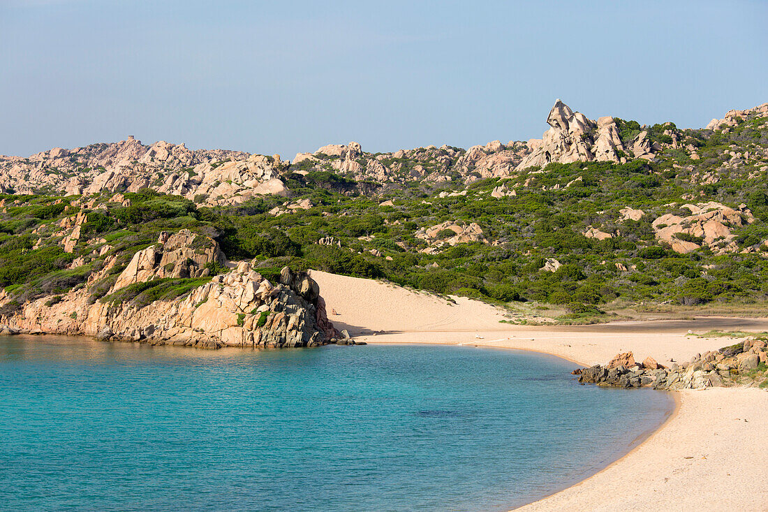 Shallow turquoise waters lapping shore of the Spiaggia Monti d'a Rena (Monte d'Arena) (Monte di Rena), La Maddalena Island, La Maddalena Archipelago National Park, Sassari, Sardinia, Italy, Mediterranean, Europe