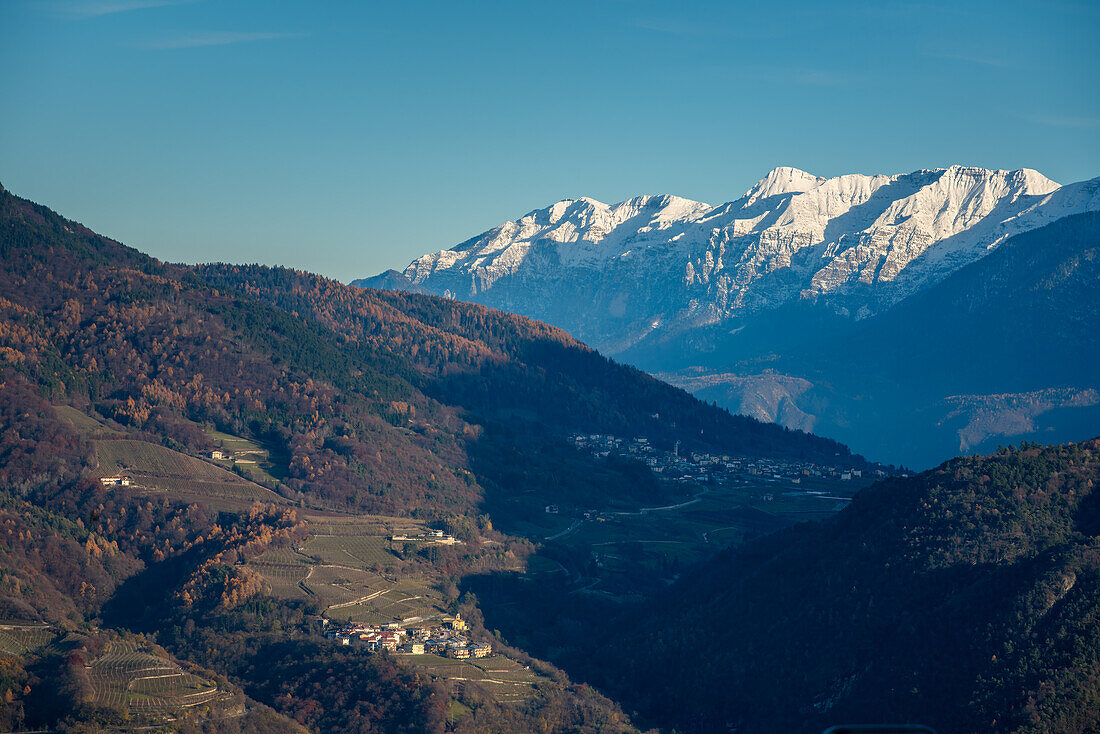 Mountains covered in snow and Vigolo Vattaro and Valsorda villages, Trentino, Italy, Europe