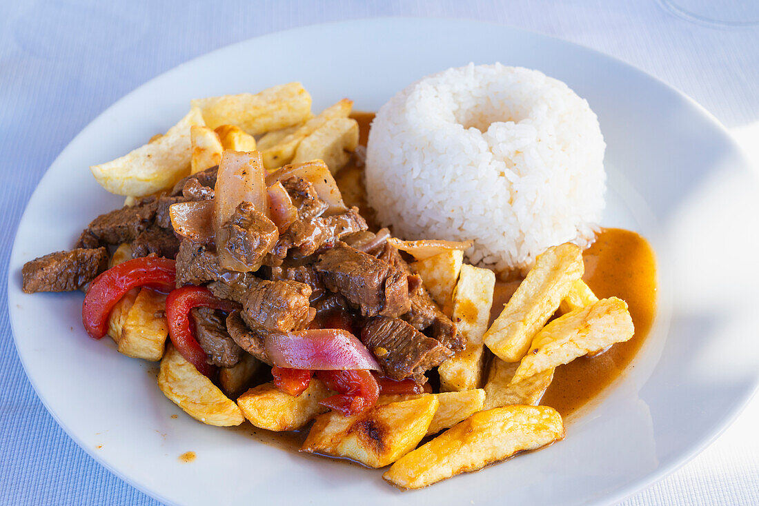 Traditional Peruvian dish named lomo saltado, Maras, Sacred Valley, Urubamba Province, Cusco (Cuzco) Region, Peru, South America