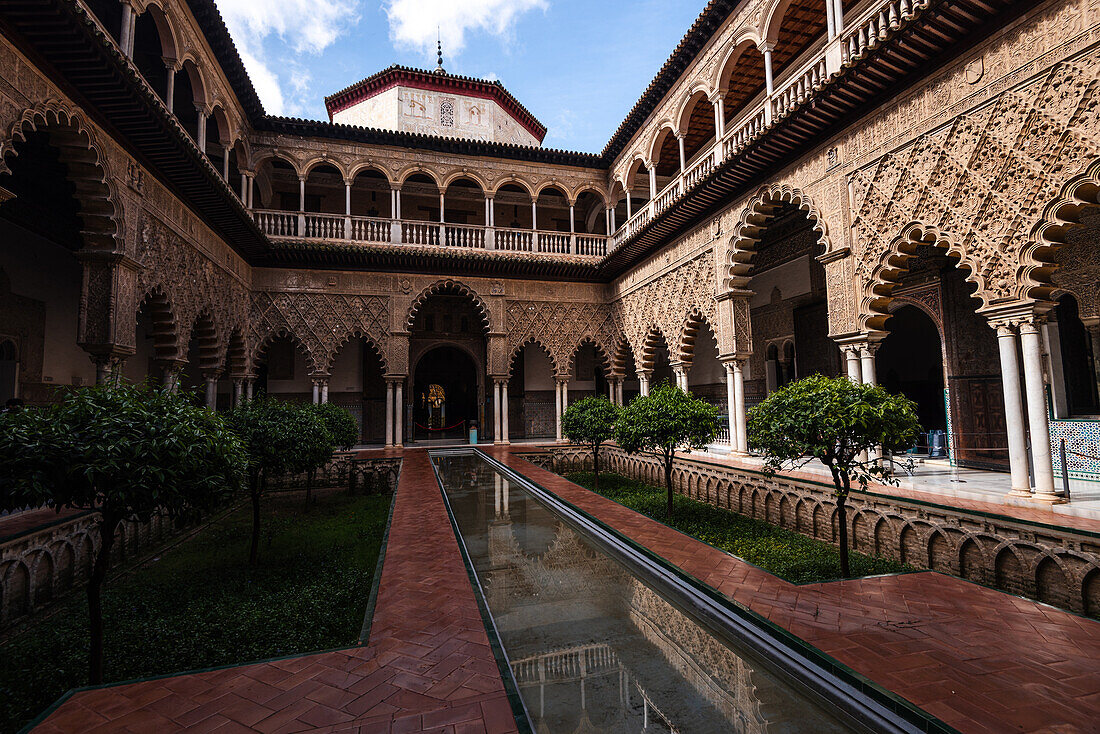 Patio de las Doncellas (Courtyard of the Maidens) with Arabesque Mudejar plasterwork, Alcazar of Seville, UNESCO World Heritage Site, Seville, Andalusia, Spain, Europe