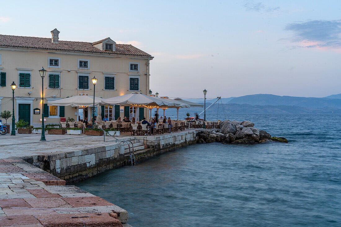 View of Faliraki Corfu at dusk in Corfu Town, Corfu, Ionian Sea, Greek Islands, Greece, Europe