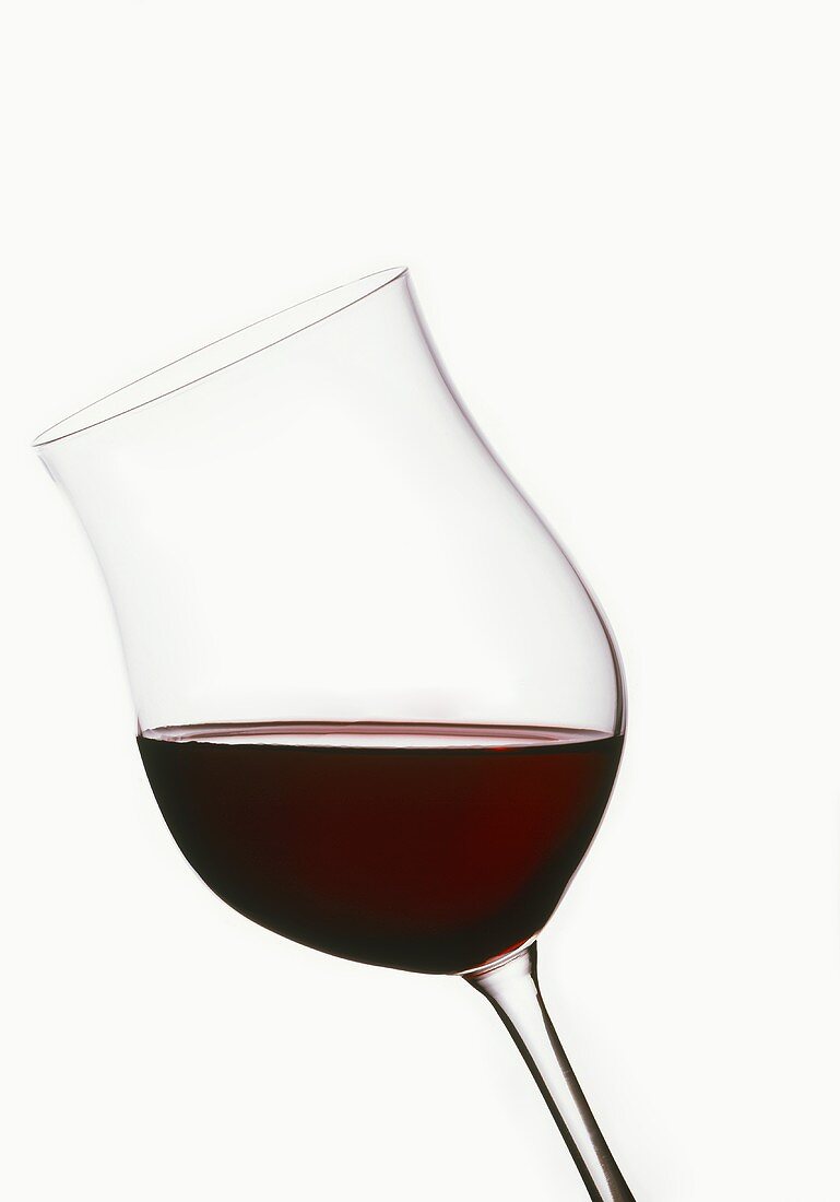 Glass of red wine from Cahors, France (dark-red colour)