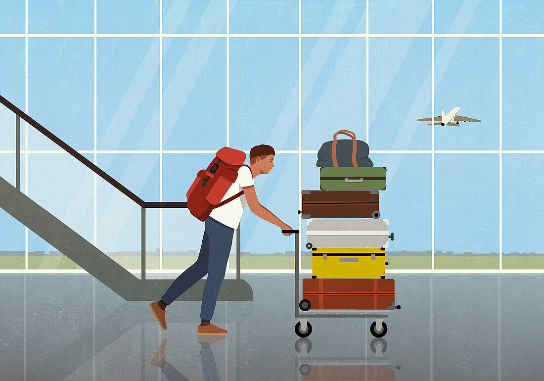 Young man with backpack pushing cart with stack of suitcases in airport