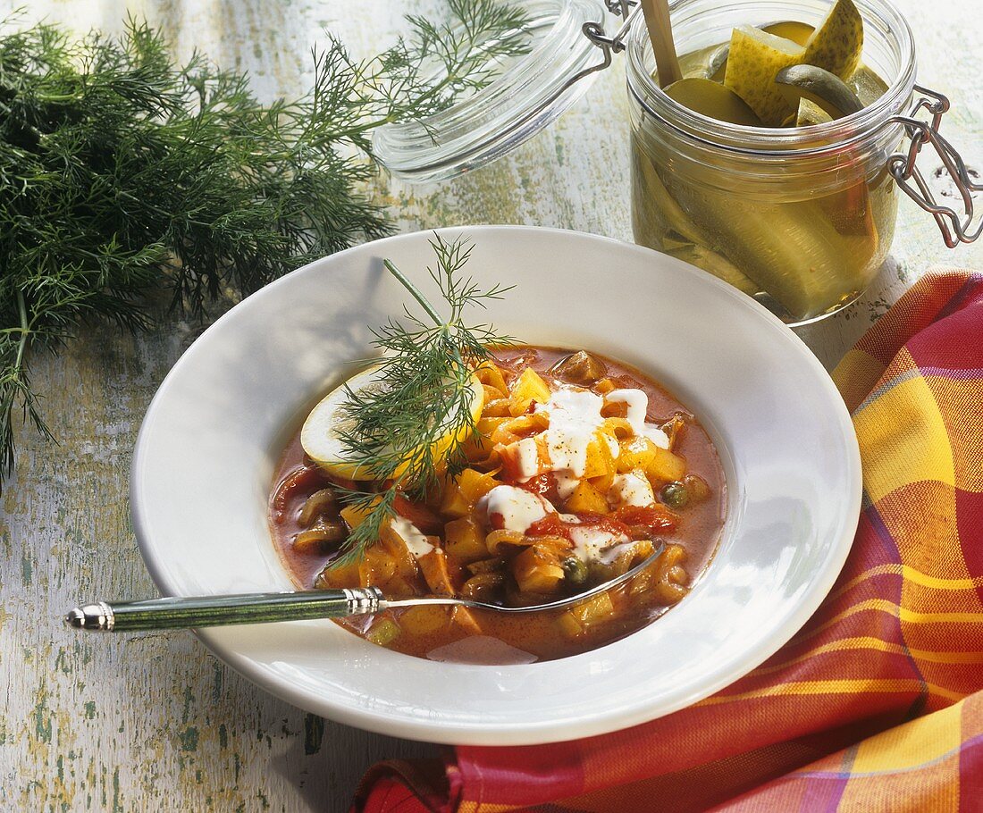 Solyanka (Russian stew with sausage, vegetables & sour cream)