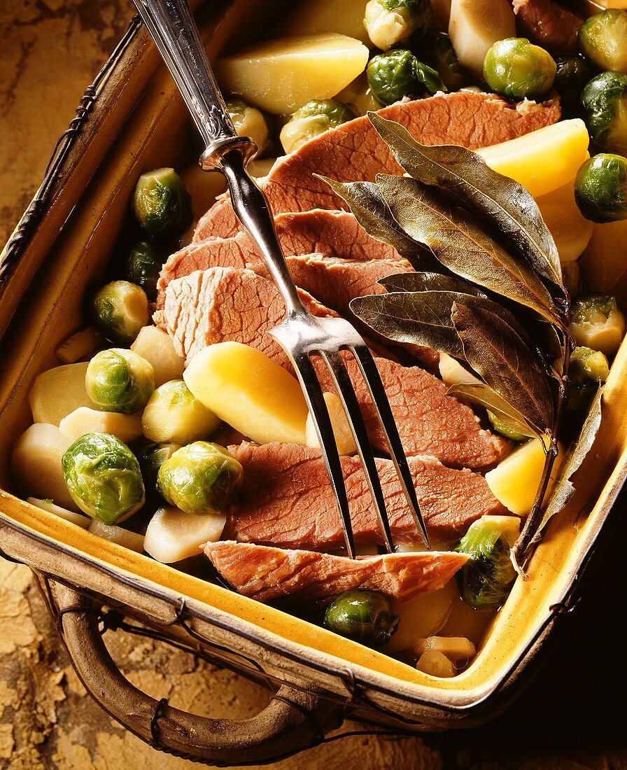 Boiled beef with potatoes and Brussels sprouts