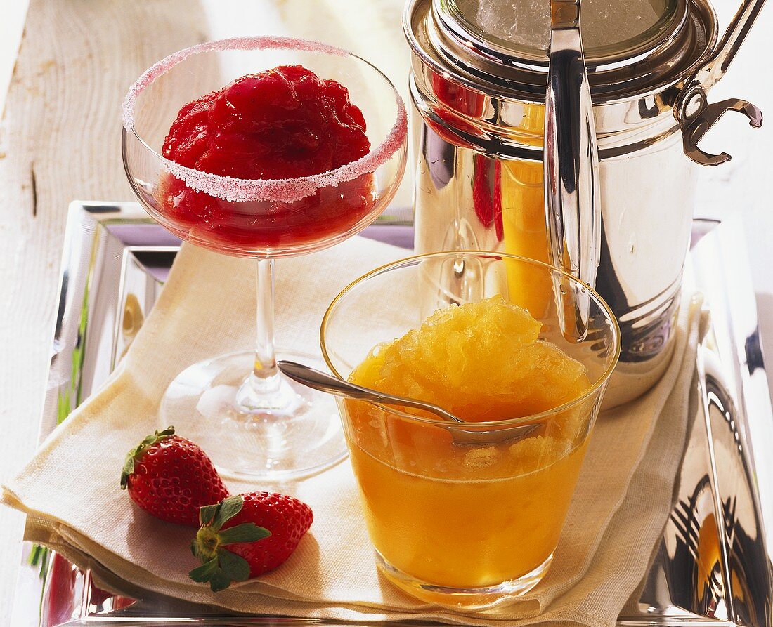 Strawberry & cranberry sorbet and mango sorbet in glasses