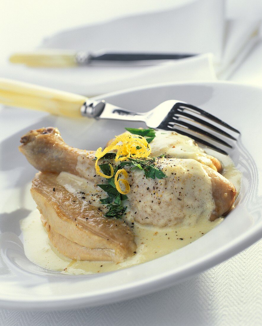 Chicken in lemon cream sauce on plate