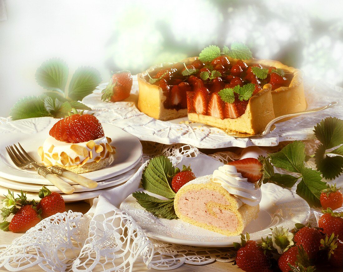 Strawberry sponge roll, cream tartlet & tart