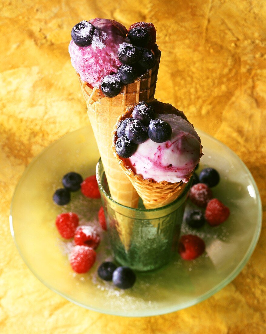 Two ice cream wafers with blueberry yoghurt ice cream