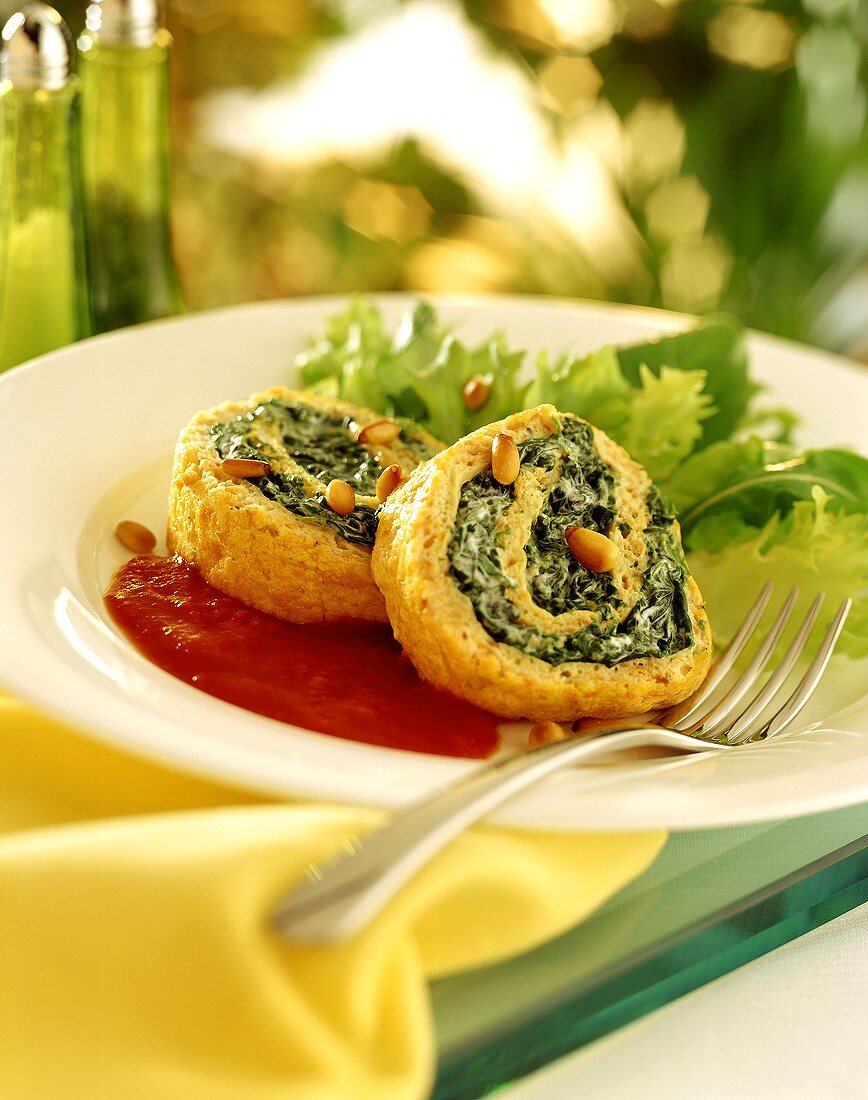 Carrot omelette & spinach roulade on tomato sauce