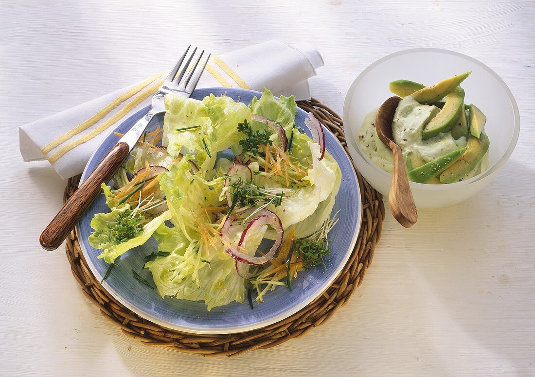 Iceberg lettuce with cress and avocado dressing with fruit