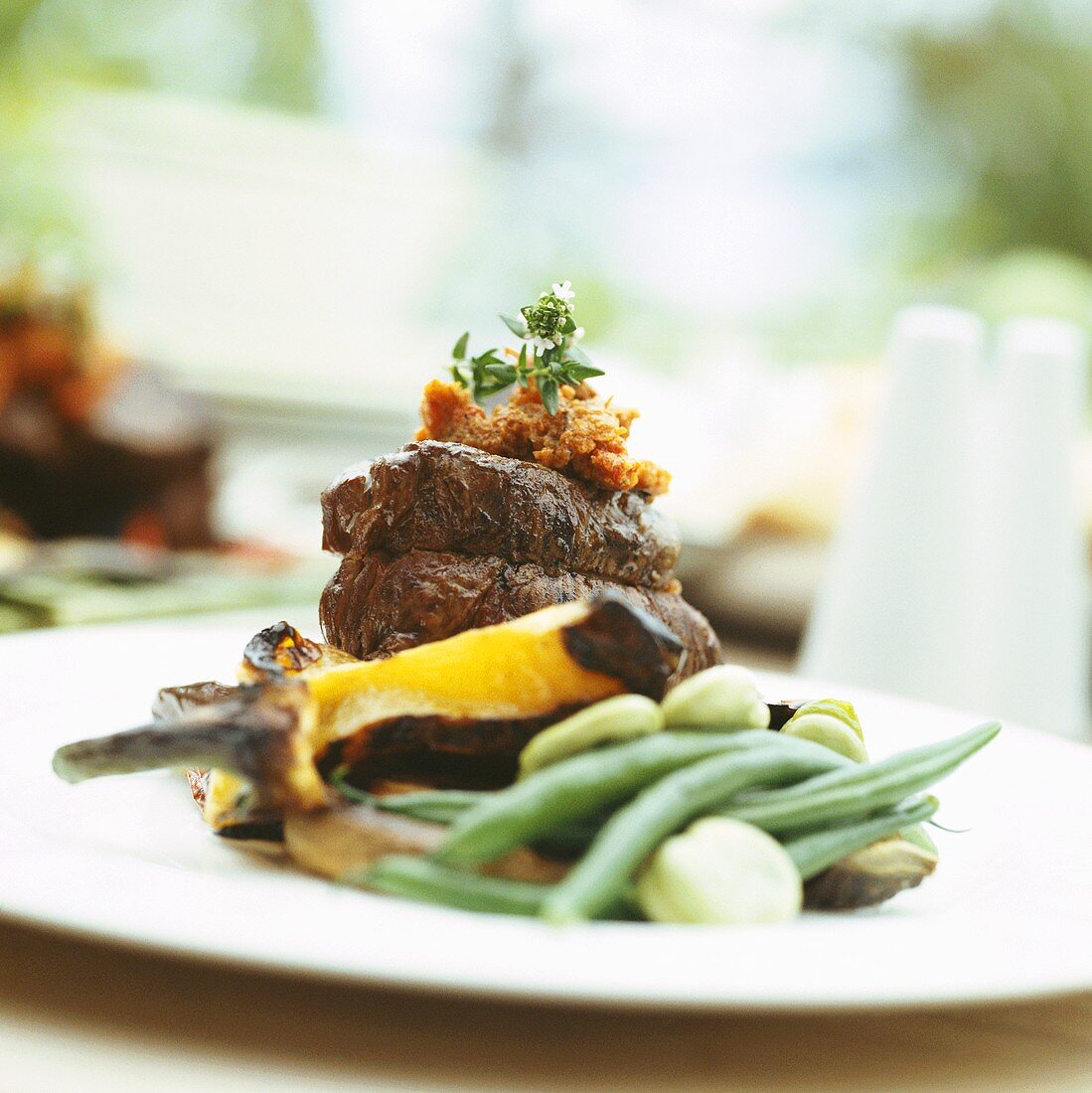 Beef fillet with lentil puree and beans