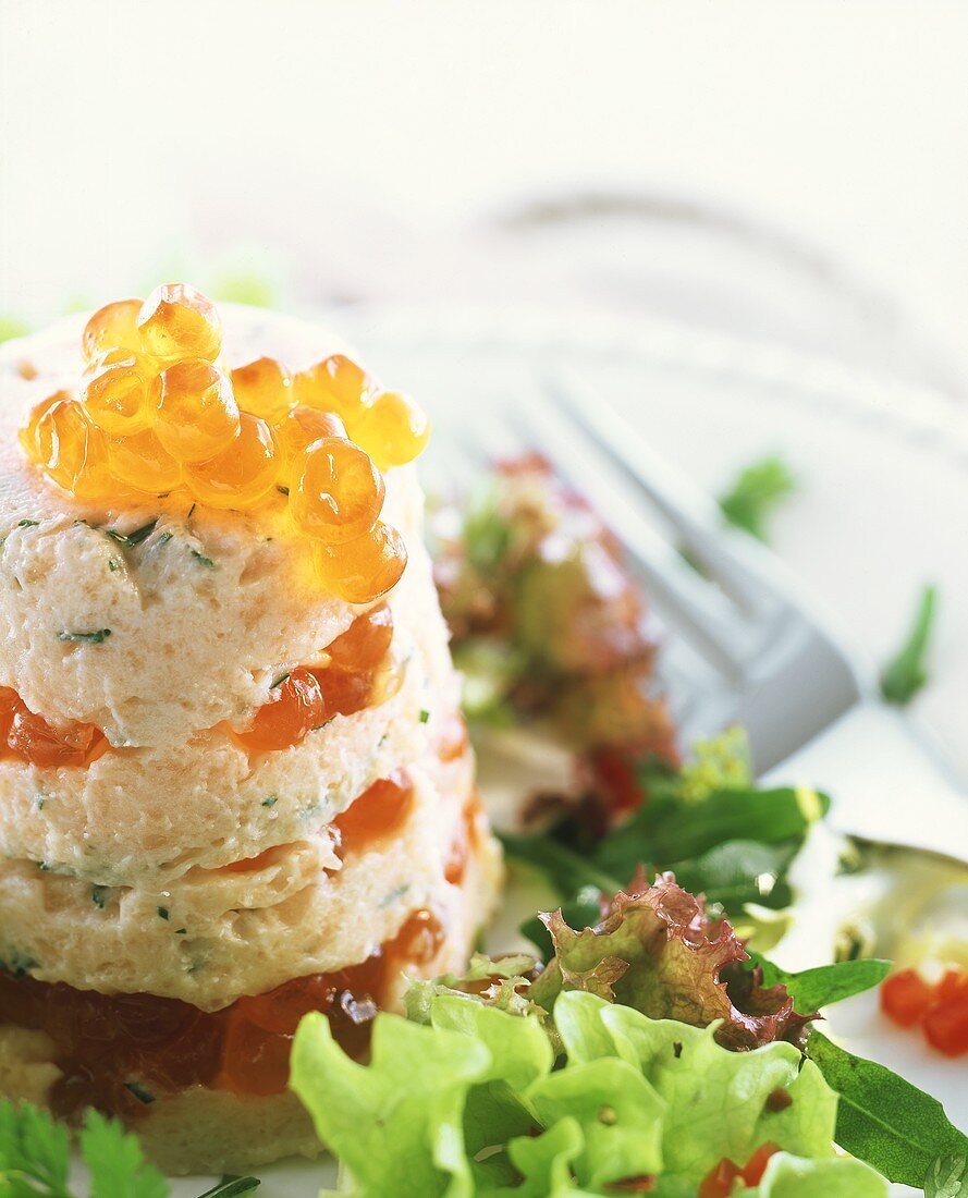 Smoked salmon timbale with caviare on lettuce