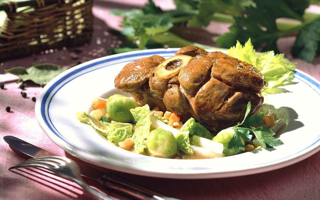 Braised shin of veal with vegetables (Osso buco con verdure)