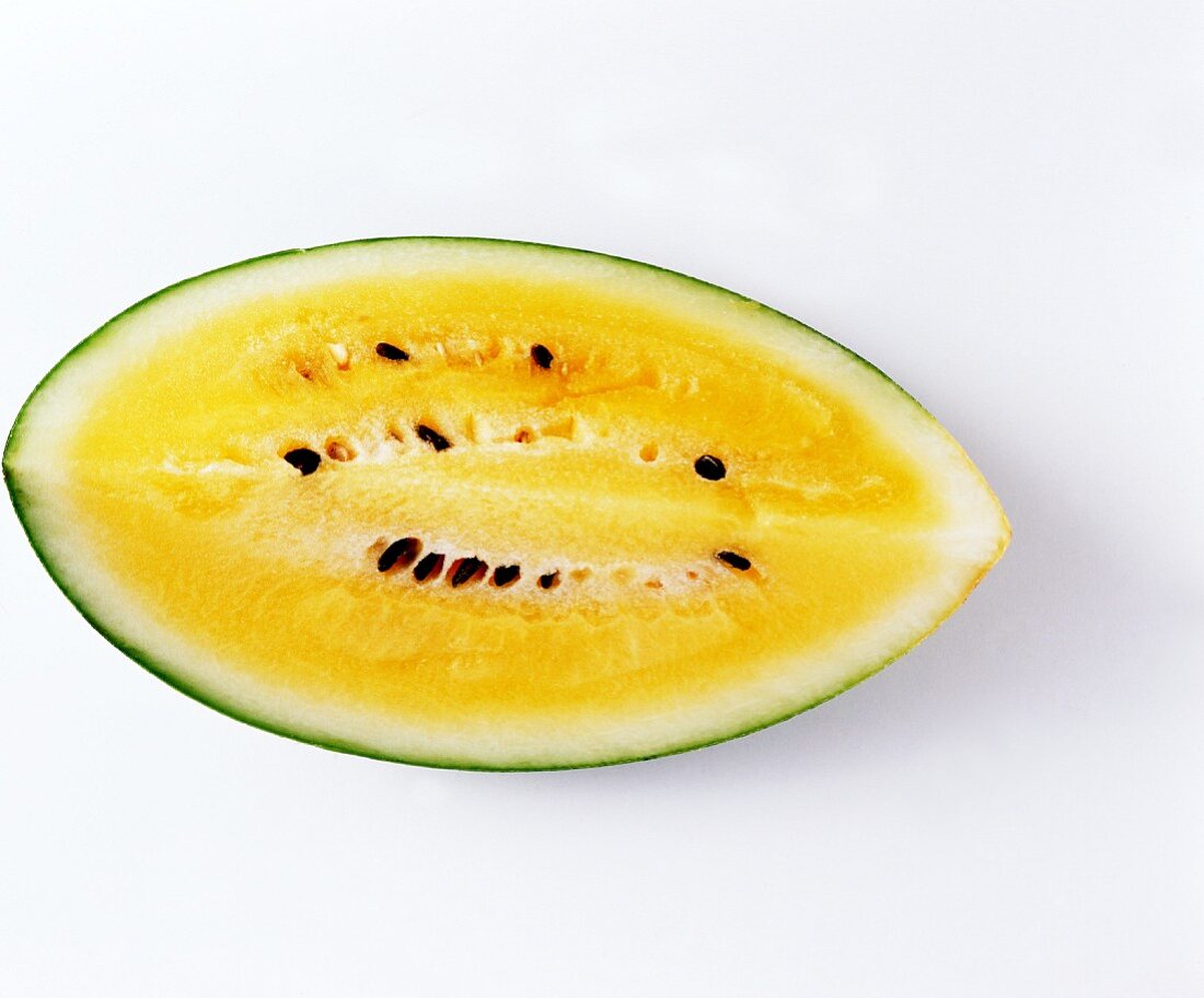 A slice of pineapple melon (yellow watermelon)