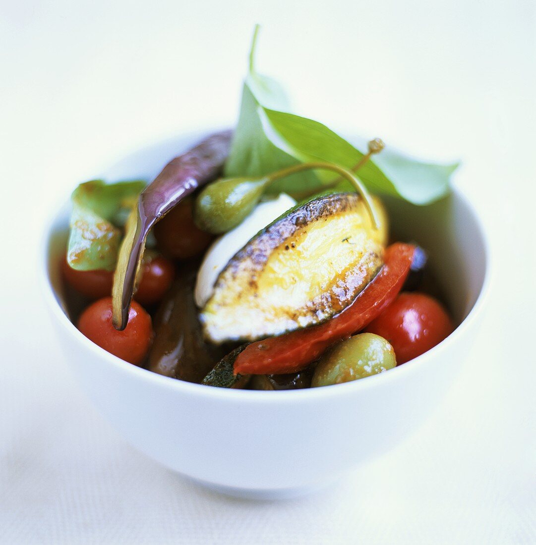 Roast vegetables in a white bowl