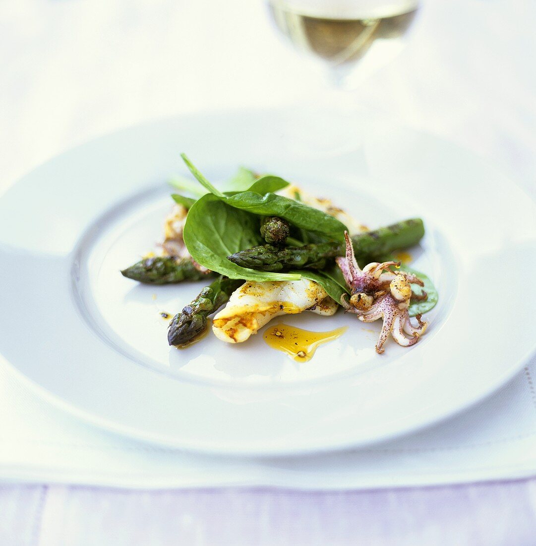 Arrangement of green asparagus and seafood