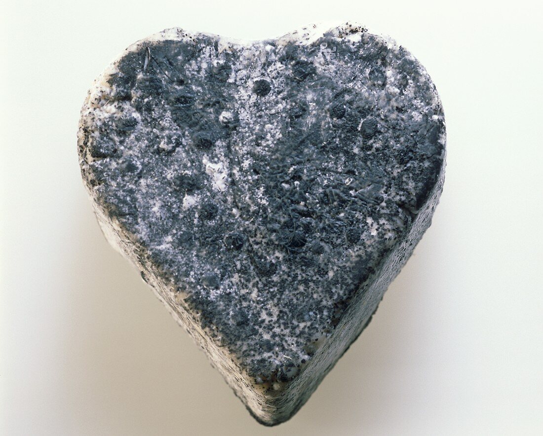 A heart-shaped goat's cheese in ash