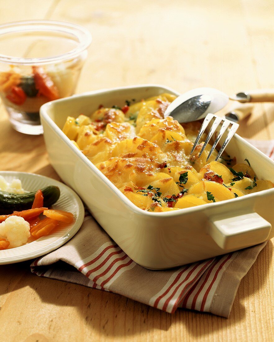 Potato gratin with mixed pickles