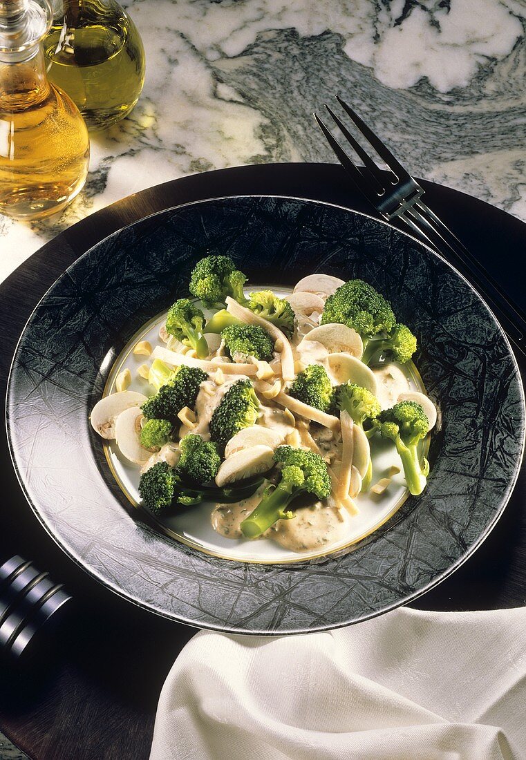 Broccoli salad with mushrooms, peanuts and turkey breast