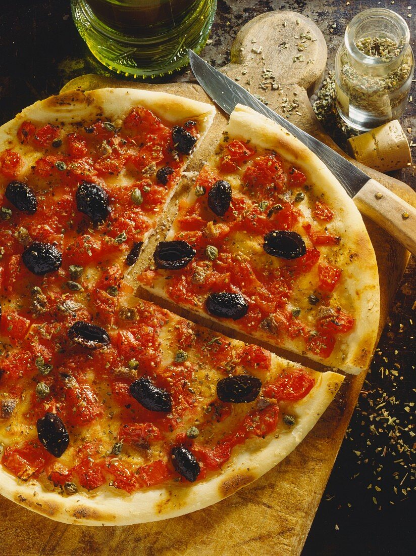 Pizza marinara (pizza with olives and anchovies, Italy)
