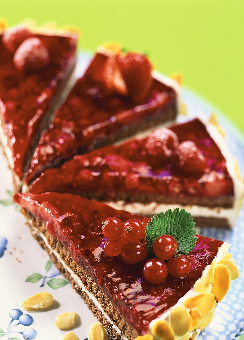 Red berry tart with cherries and berries