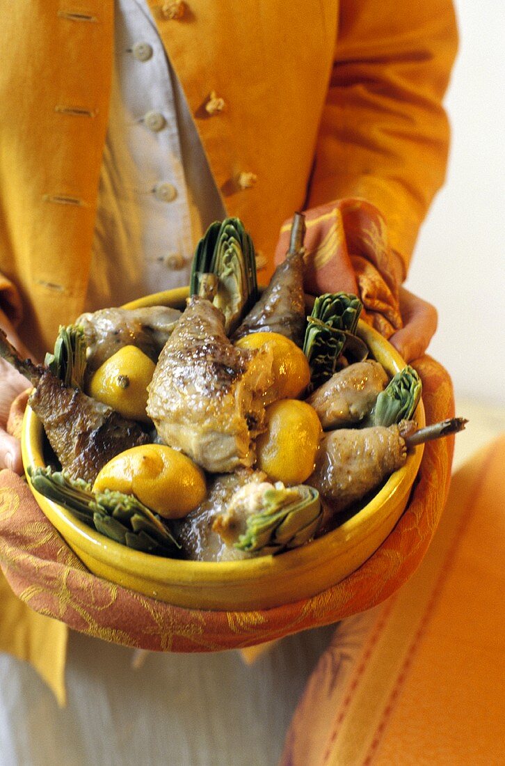 Braised duck legs with artichokes and lemons