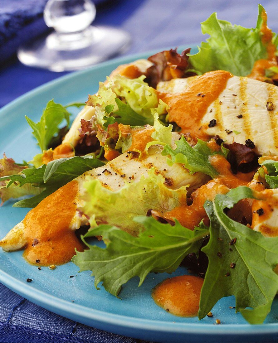 Salad leaves with grilled chicken breast
