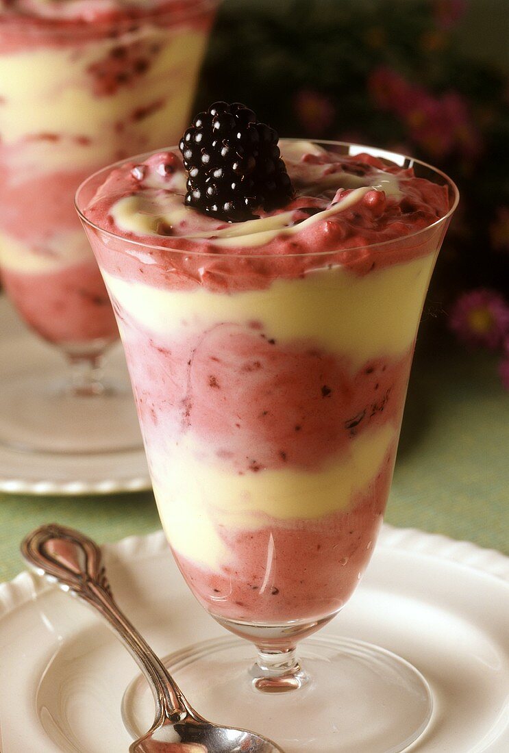 Layered sundae with blackberry and vanilla mousse