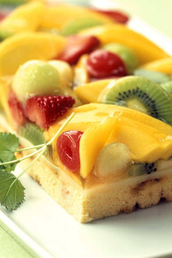 Colourful fruit tart with cake glaze