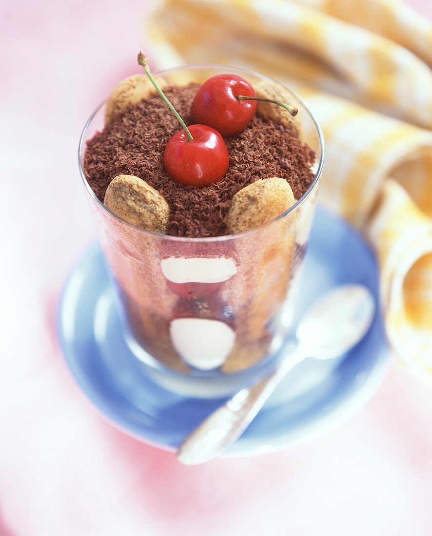 Tiramisu with cherries in a glass