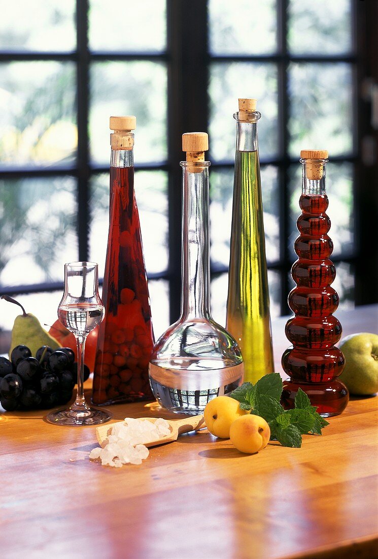 Four bottles of home-made liqueurs